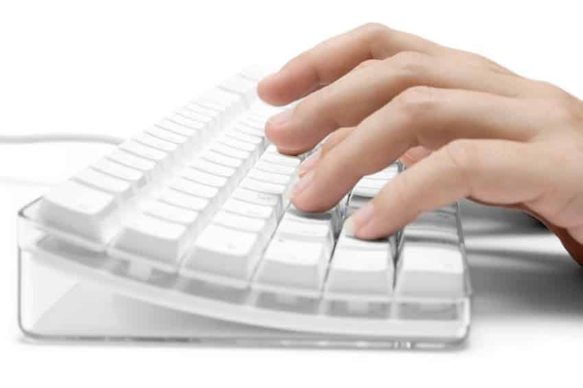 Typing on a White Computer Keyboard content marketing and content creation